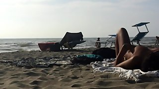 Sexy Italian Milfs topless sunbathing